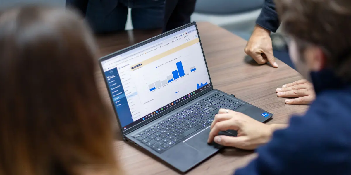 Operating Partners and Value Creation in Private Equity Operating Partner reviewing technology performance dashboards for a private equity portfolio company